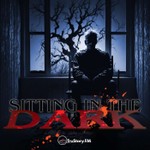 Logo of the podcast Sitting in the Dark Podcast Sitting in the Dark