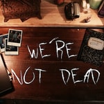 Logo of the podcast We're Not Dead Podcast We're Not Dead